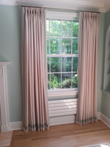 Pinch pleated curtains with custom trim